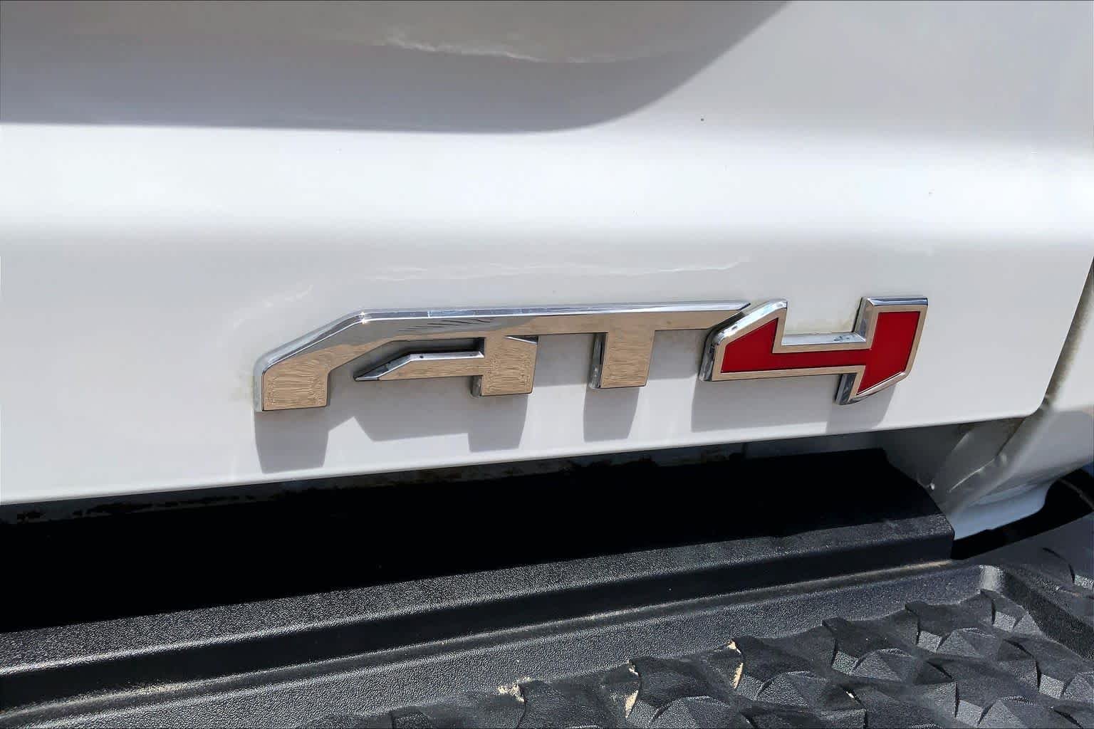 Used 2024 Summit White GMC 4WD AT4 image 17