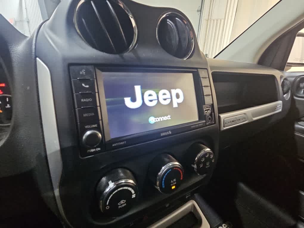 Used 2015 Black Clearcoat Jeep High Altitude Edition image 8