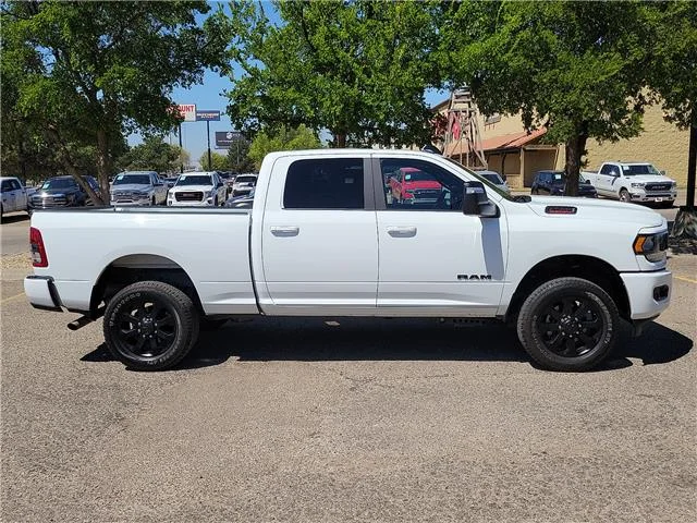 Used 2024 Bright White Clearcoat RAM Big Horn 4x4 Crew Cab 6.3 ft. box 149 in. WB image 5