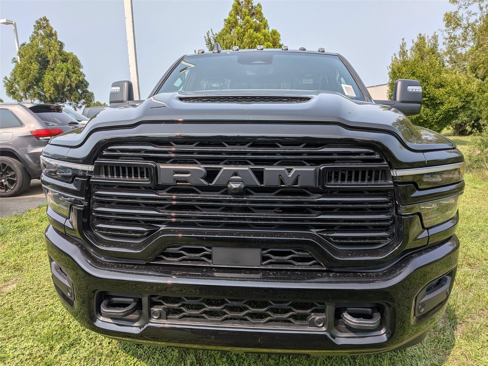 New 2026 Diamond Black Crystal Pearl-Coat Exterior Paint RAM Laramie image 1