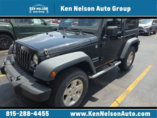 Used 2014 Black Clearcoat Jeep Sport image 1