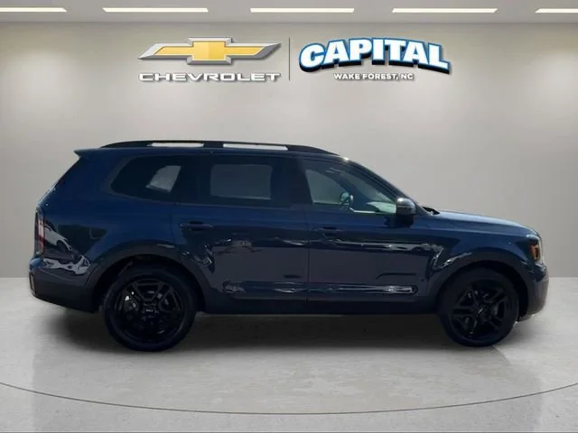 Used 2024 Blue Kia EX X-Line image 6