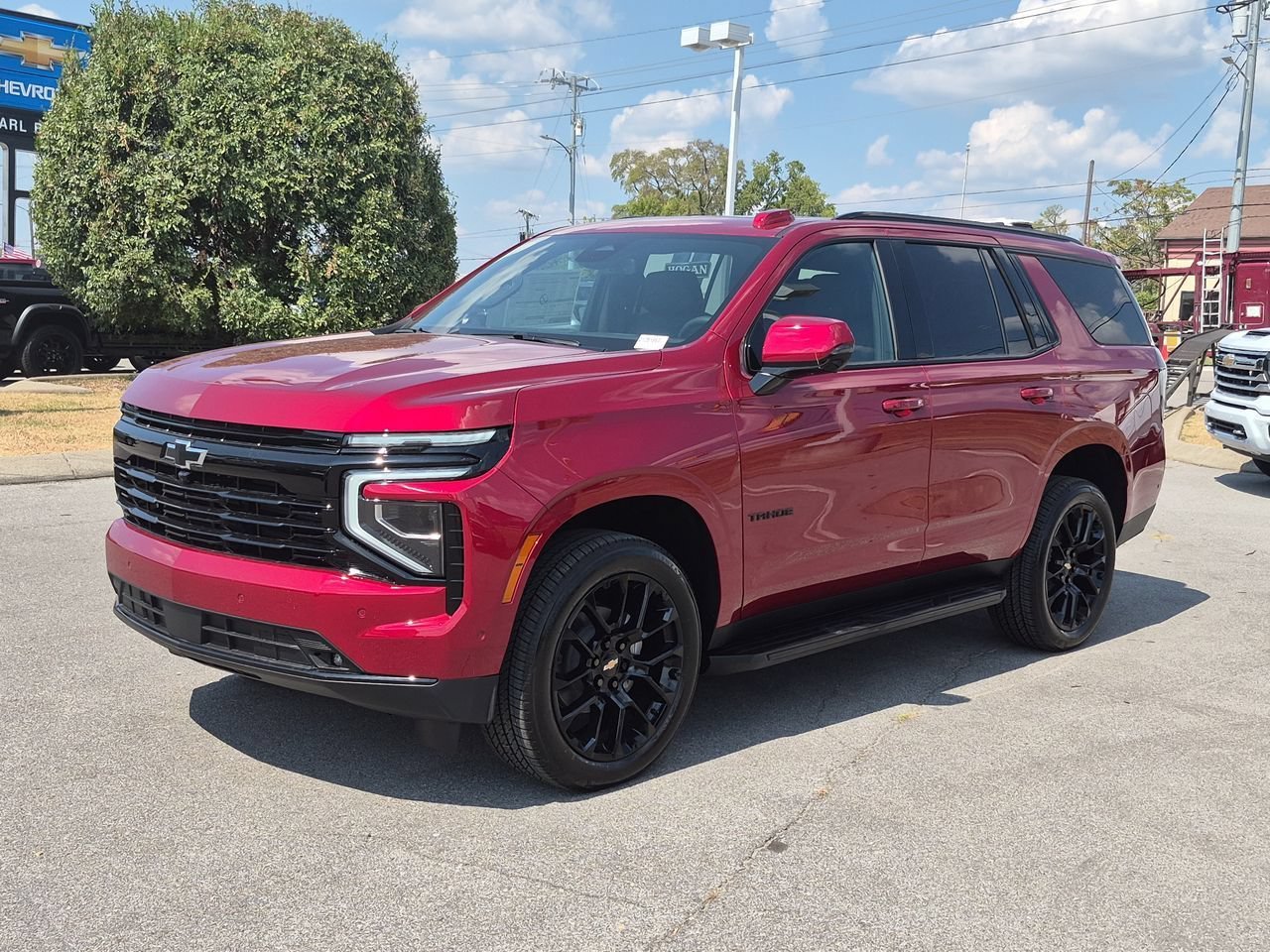 New 2026 Radiant Red Tintcoat Chevrolet RST image 1