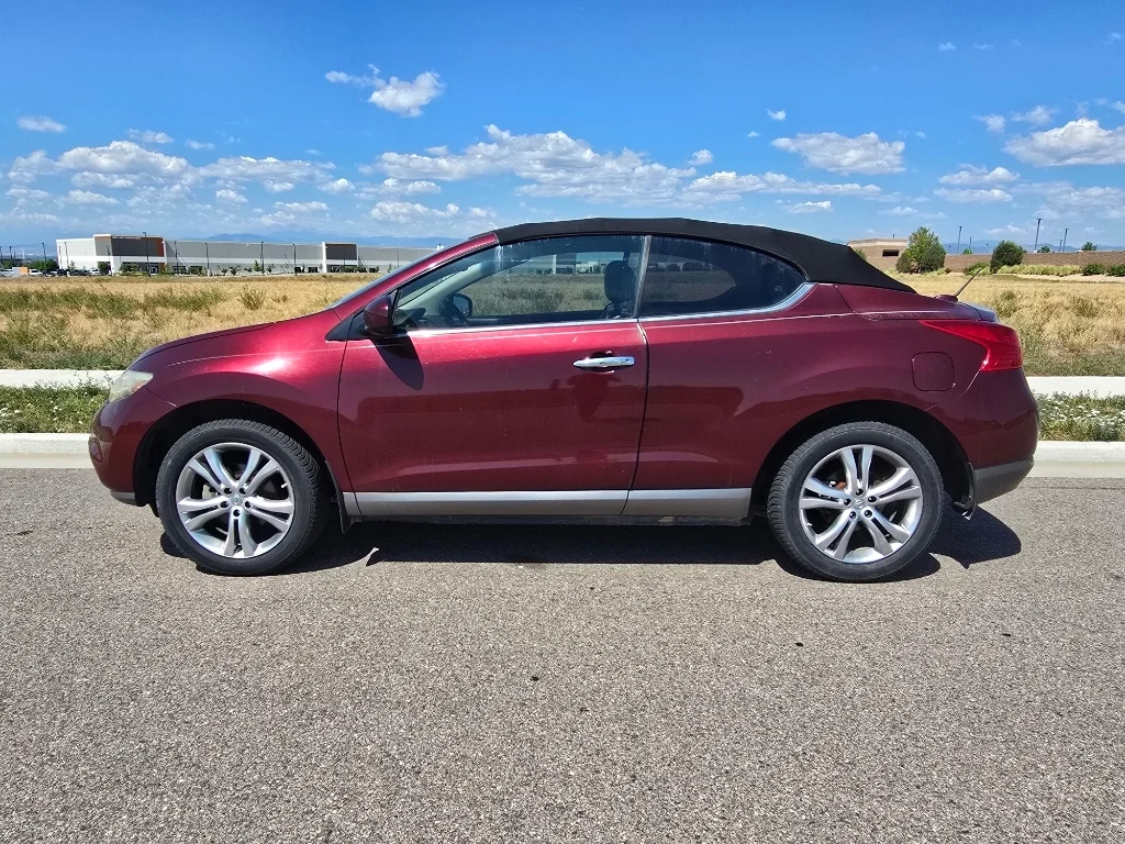 Used 2011 Merlot Metallic Nissan Base image 2