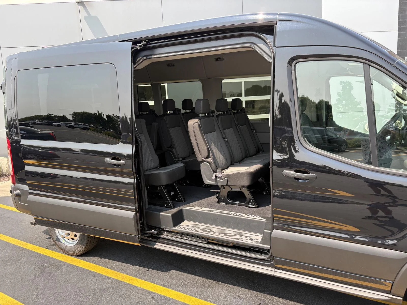 New 2026 Agate Black Metallic Ford Passenger Van XLT image 19
