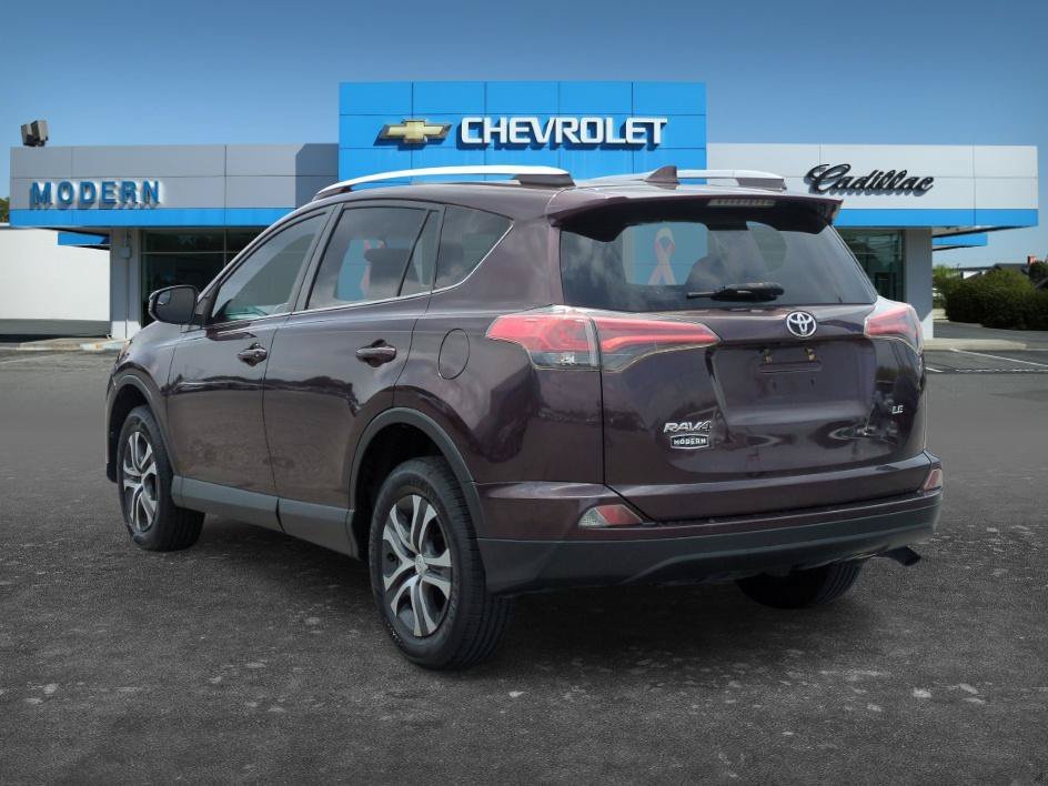 Used 2016 Black Currant Metallic Toyota LE image 3