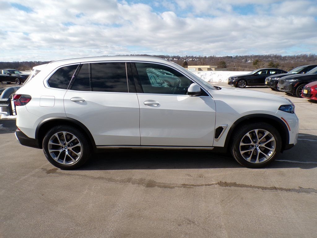 Certified Used 2026 Mineral White Metallic BMW xDrive50e image 7