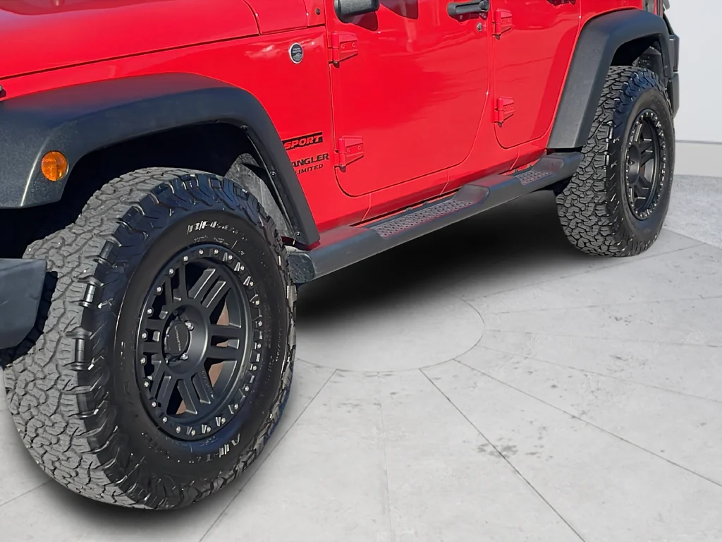 Used 2013 Red Jeep Unlimited Sport image 42