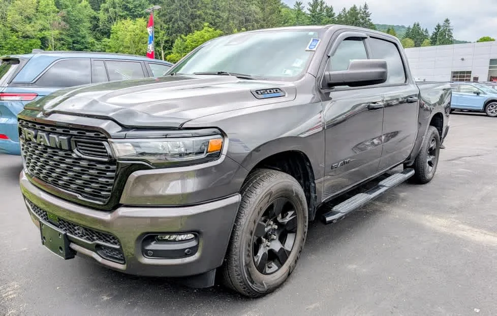 Used 2025 Granite Crystal Metallic Clearcoat Ram Tradesman image 3