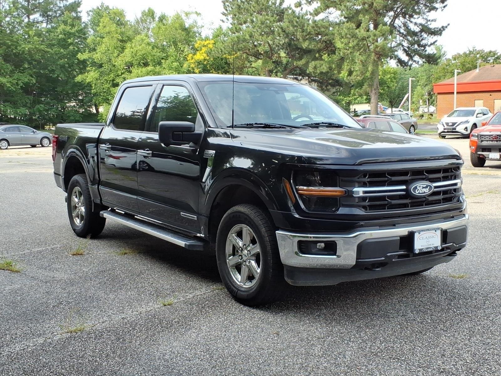 Used 2024 Agate Black Metallic Ford XLT image 5