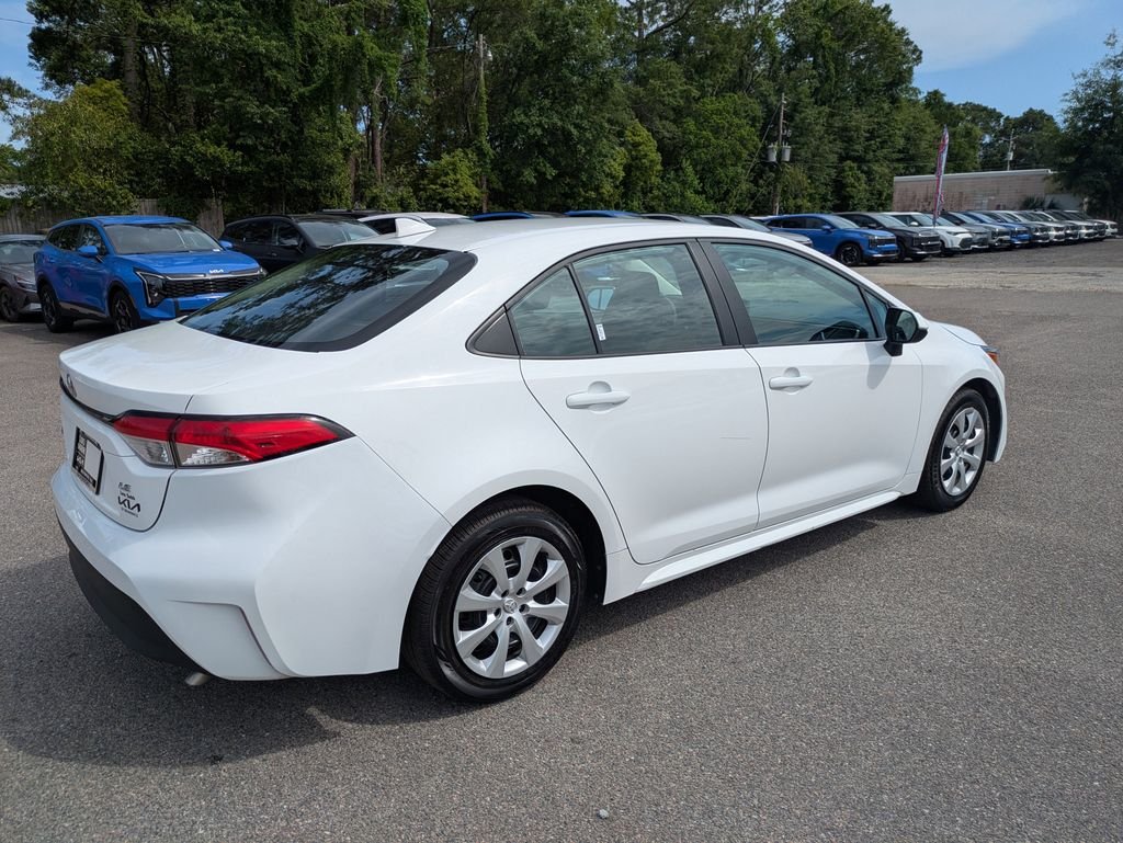 Used 2025 White Toyota LE image 4