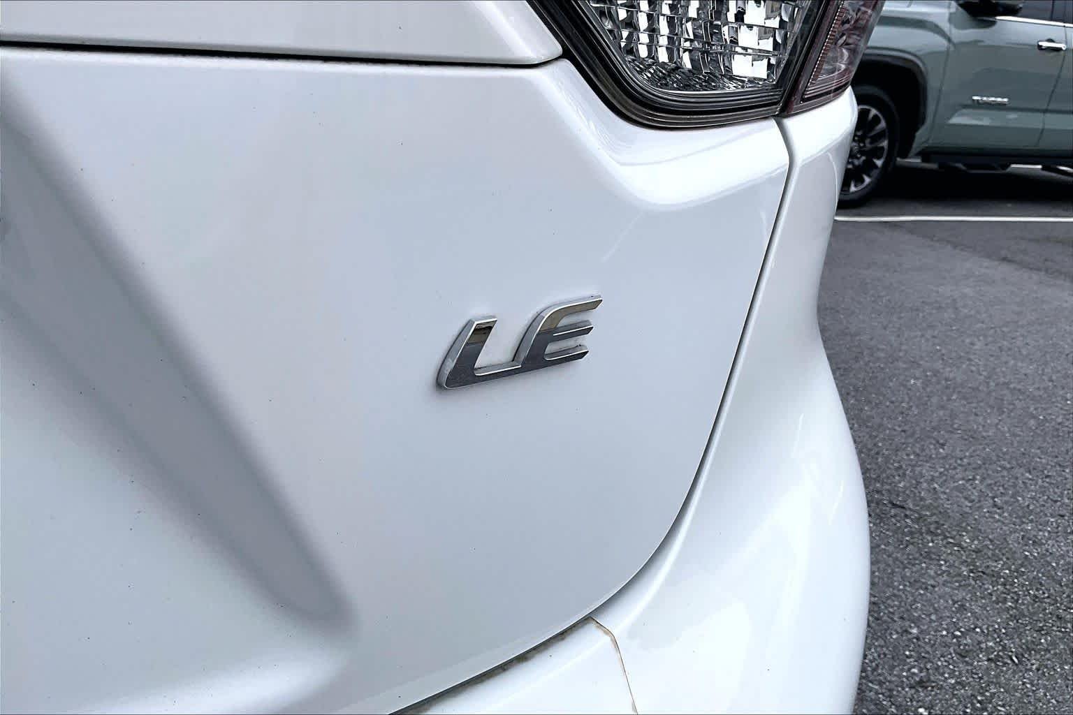 Used 2021 Super White Toyota LE image 10