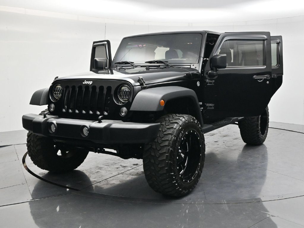 Used 2014 Black Clearcoat Jeep Unlimited Sport image 55