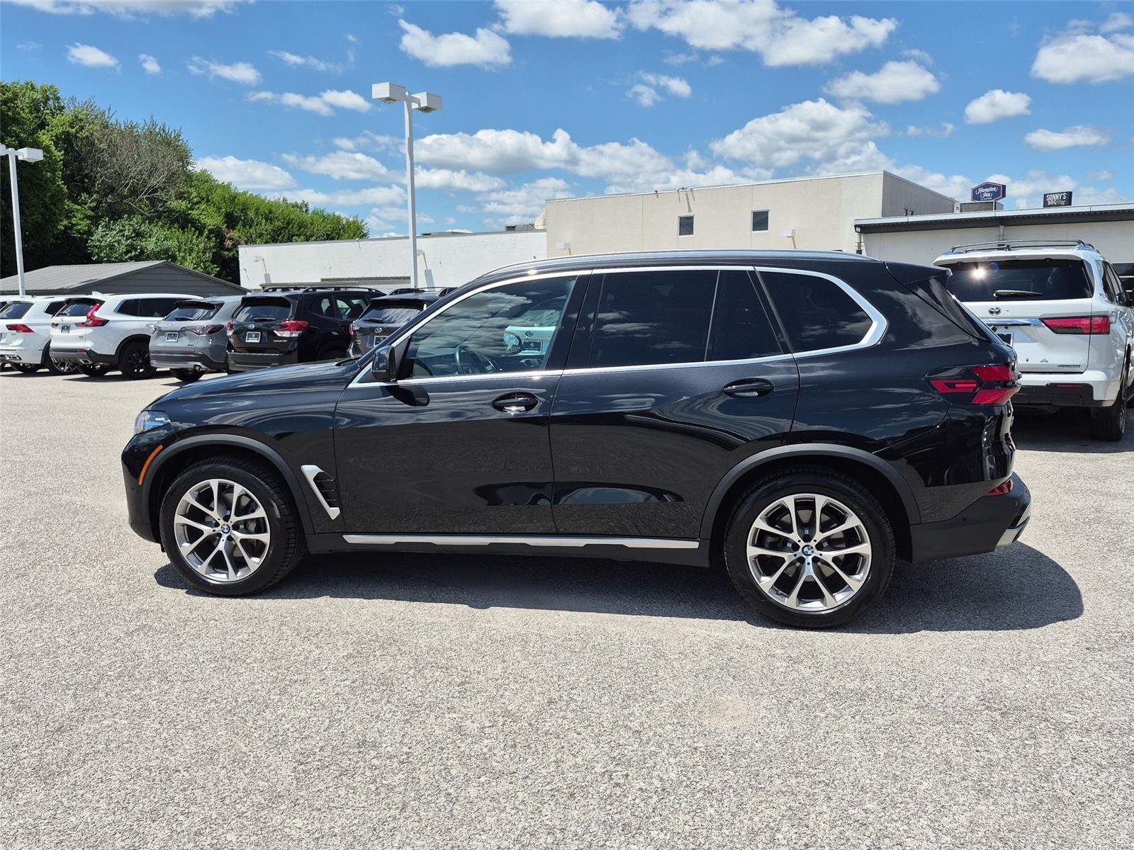 Used 2024 Black Sapphire Metallic BMW xDrive40i image 2