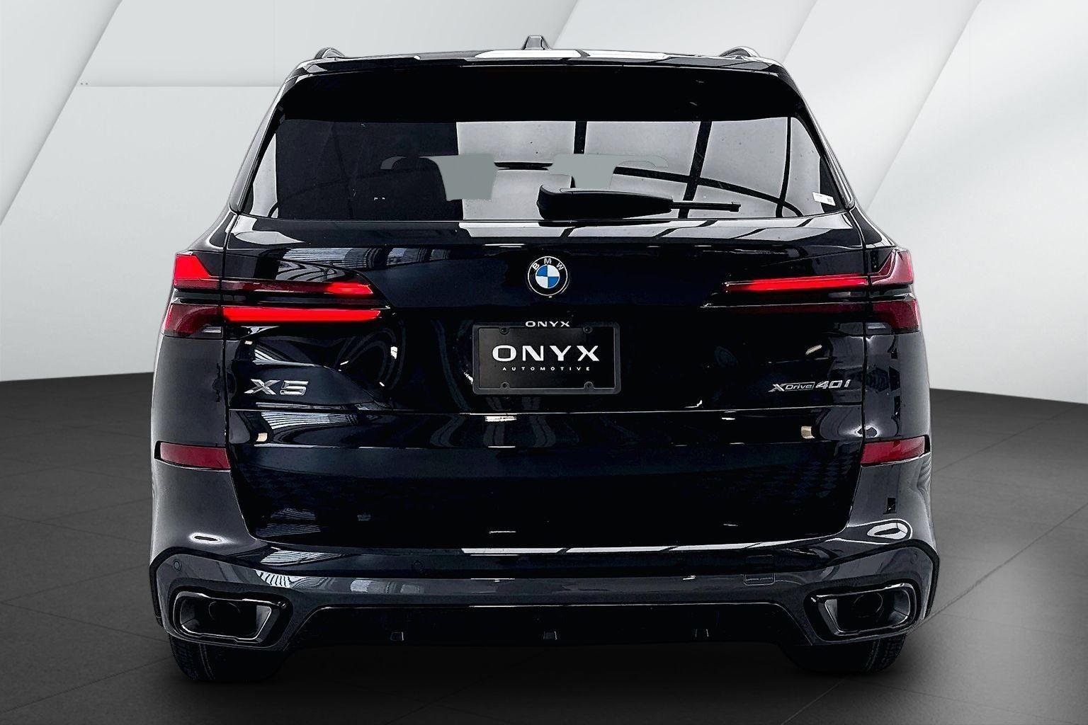 New 2026 Black Sapphire Metallic BMW xDrive40i image 7