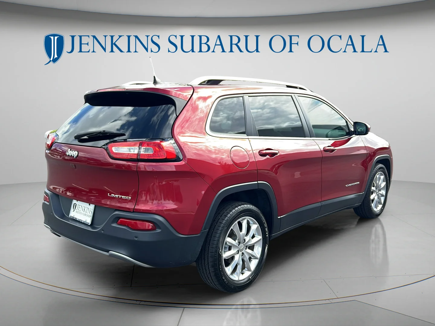 Used 2016 Deep Cherry Red Crystal Pearlcoat Jeep Limited image 3