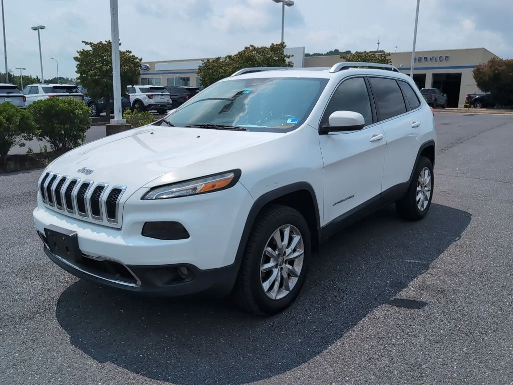 Used 2015 Bright White Clearcoat Jeep Limited image 1