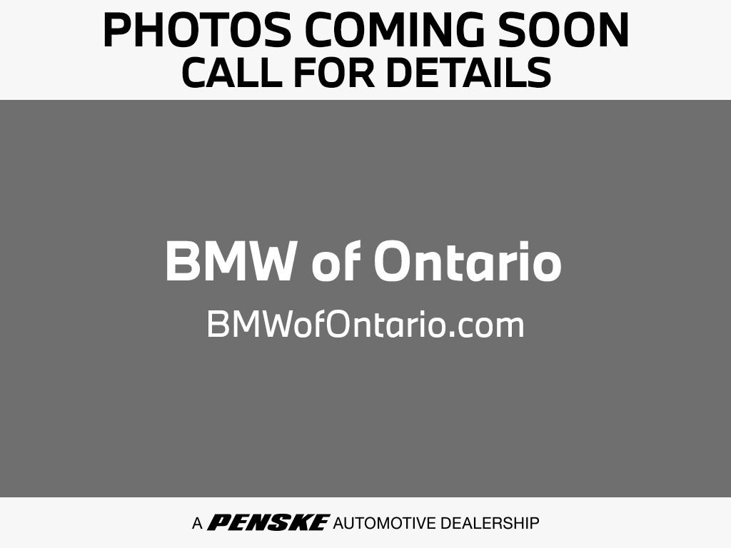 Certified Used 2023 White Metallic BMW eDrive40 image 1
