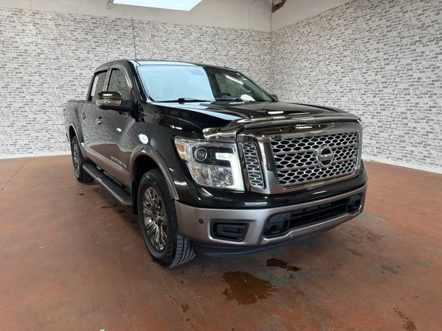 Used 2019 Magnetic Black Metallic Nissan Platinum Reserve image 1