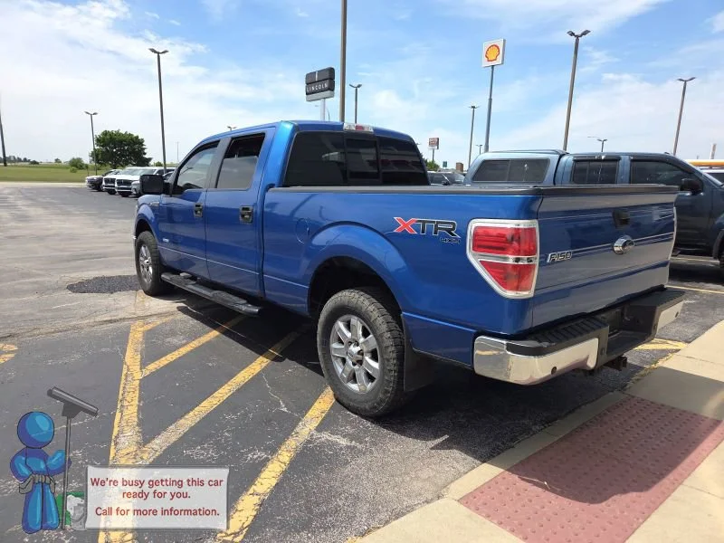 Used 2014 Blue Flame Metallic Ford XLT image 3