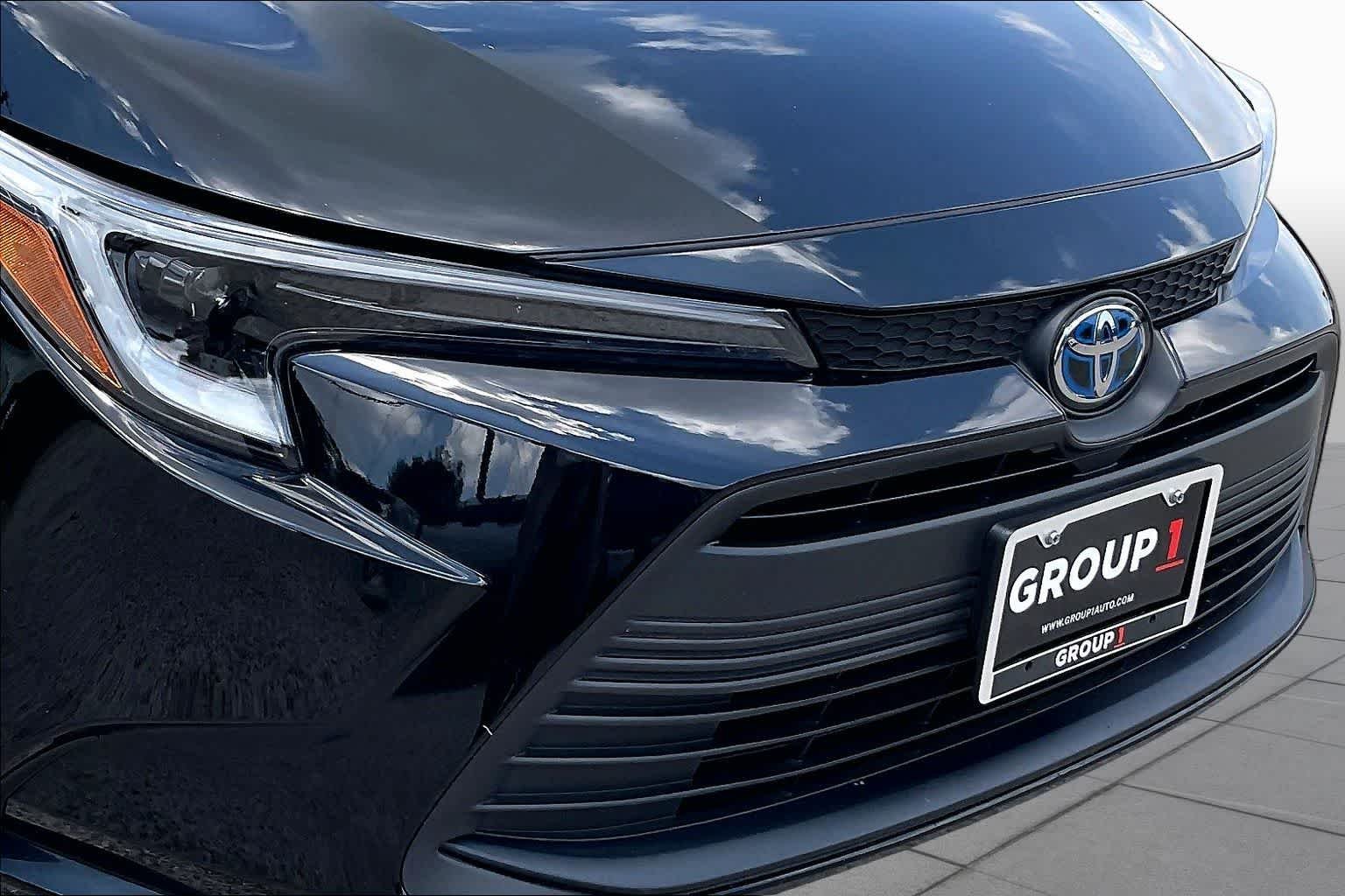 Used 2025 Midnight Black Metallic Toyota Hybrid LE image 28