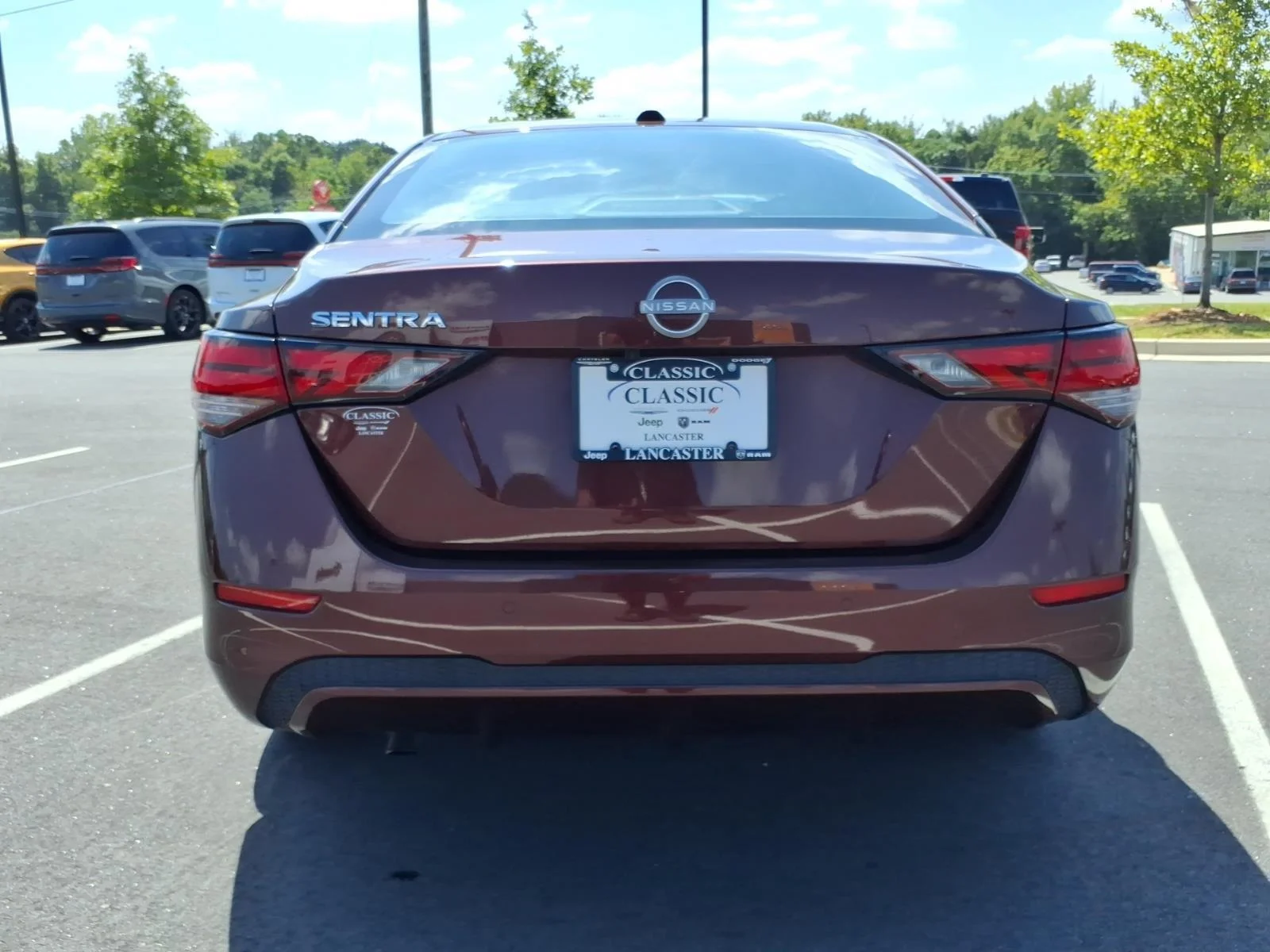 Used 2025 Rosewood Metallic Nissan SV image 16