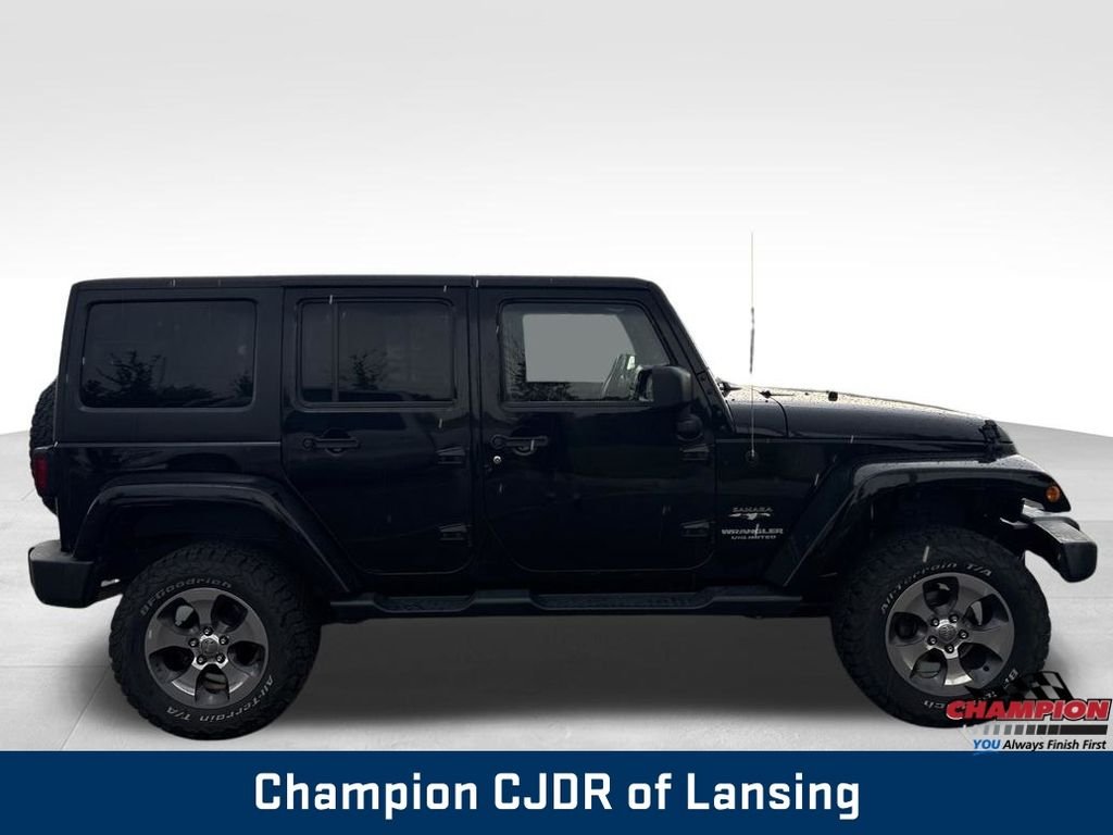 Used 2016 Black Jeep Unlimited Sahara image 8