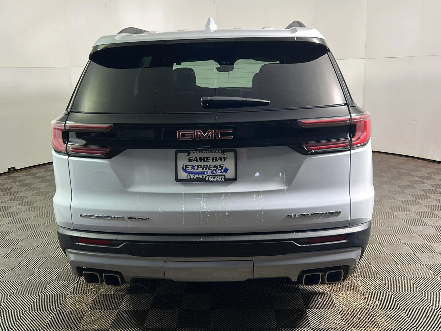 Used 2026 Glacier White Tricoat GMC AWD Elevation image 7