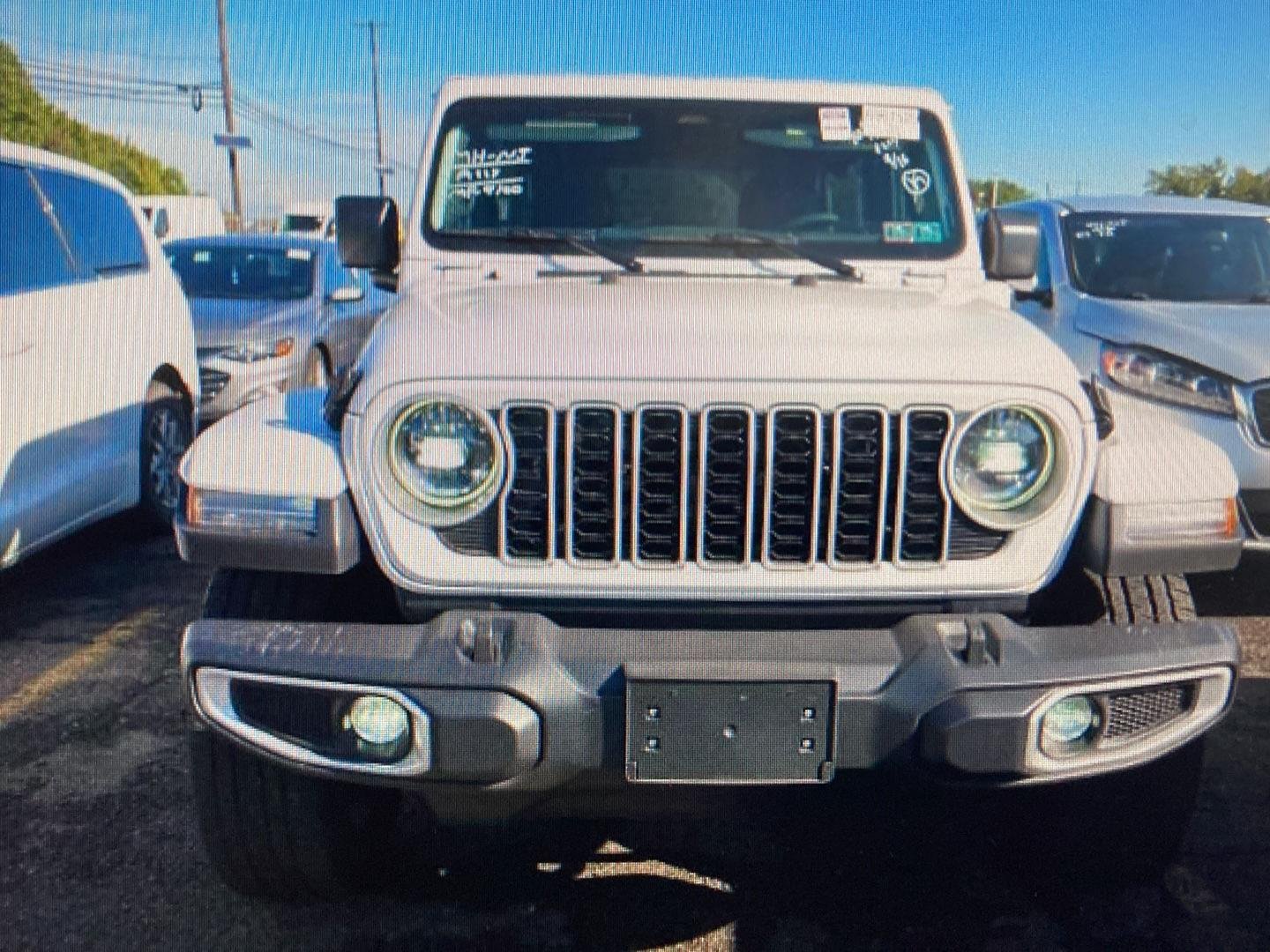 Used 2025 Bright White Clearcoat Jeep Sahara image 6