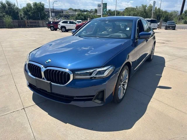 Used 2022 Blue BMW 530i xDrive image 1