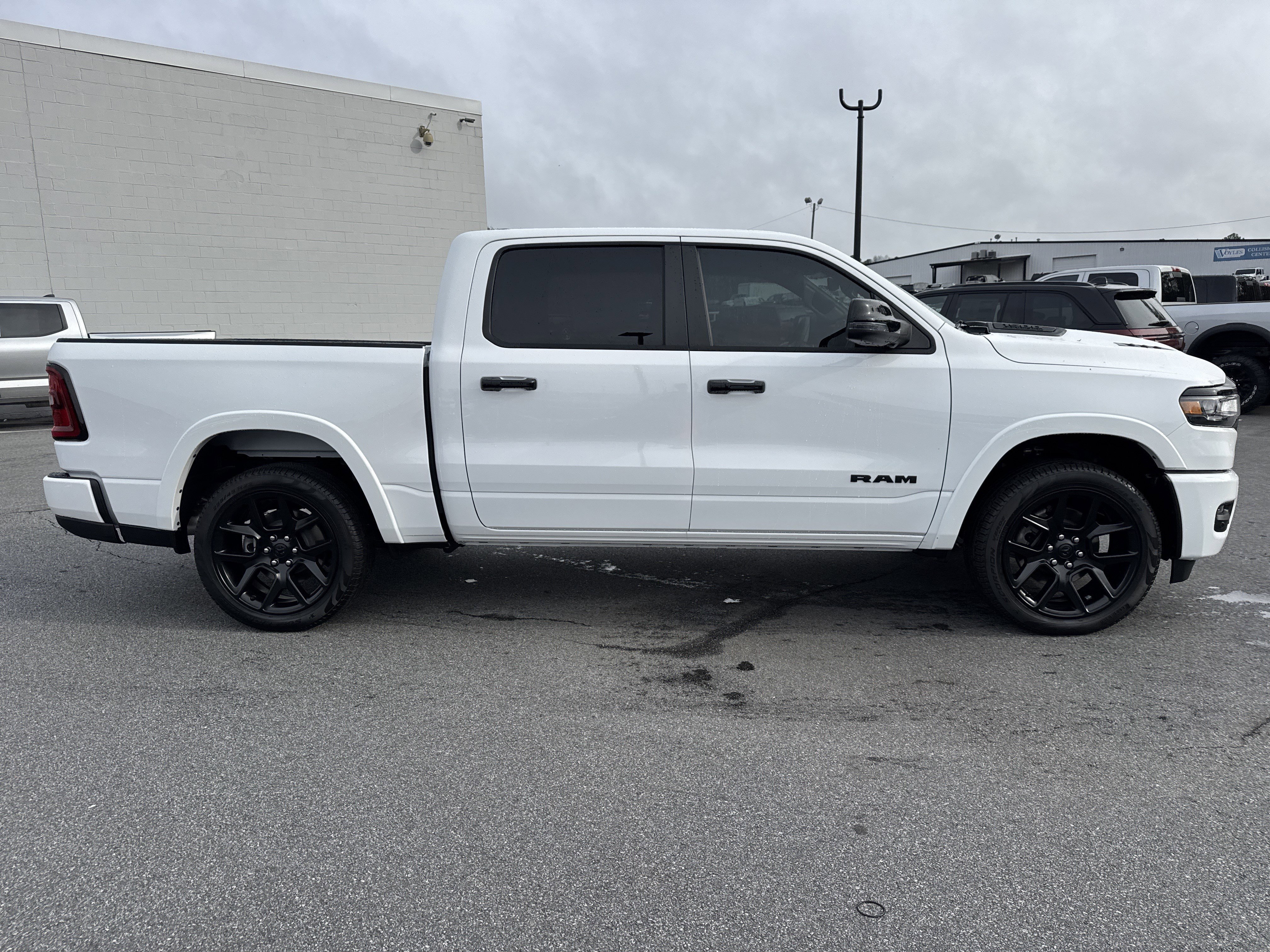 New 2026 Bright White Clear-Coat Exterior Paint RAM Laramie image 9