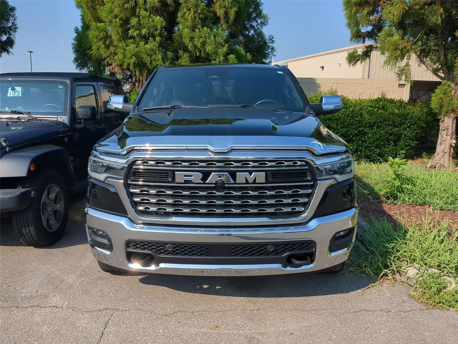 Used 2025 Diamond Black Crystal Pearlcoat Ram Limited image 2