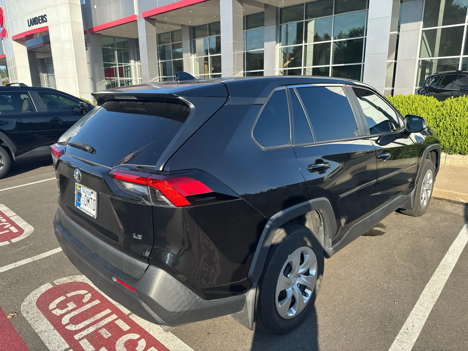 Used 2024 Midnight Black Metallic Toyota LE image 4