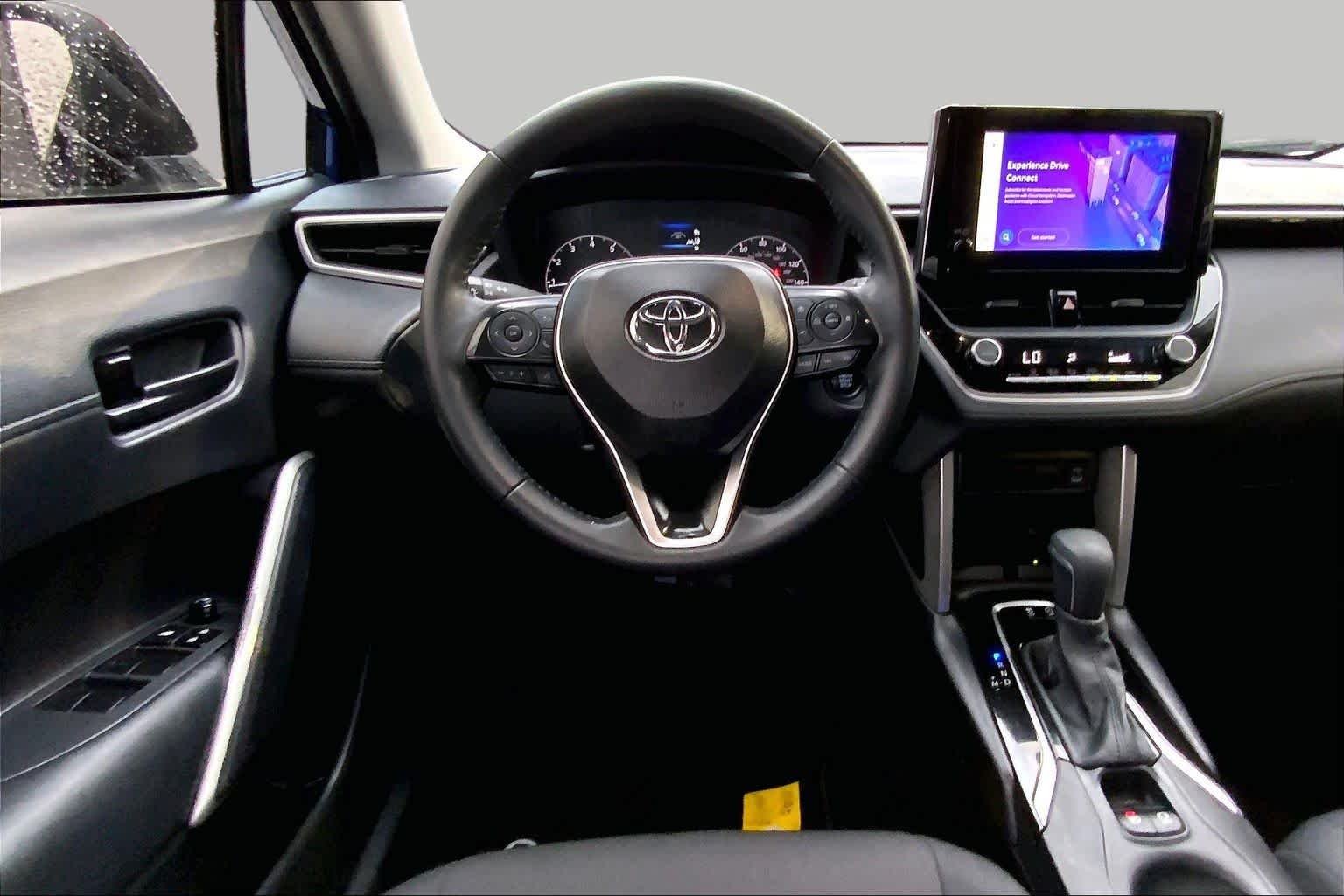 Used 2024 Blue Crush Metallic Toyota LE image 6