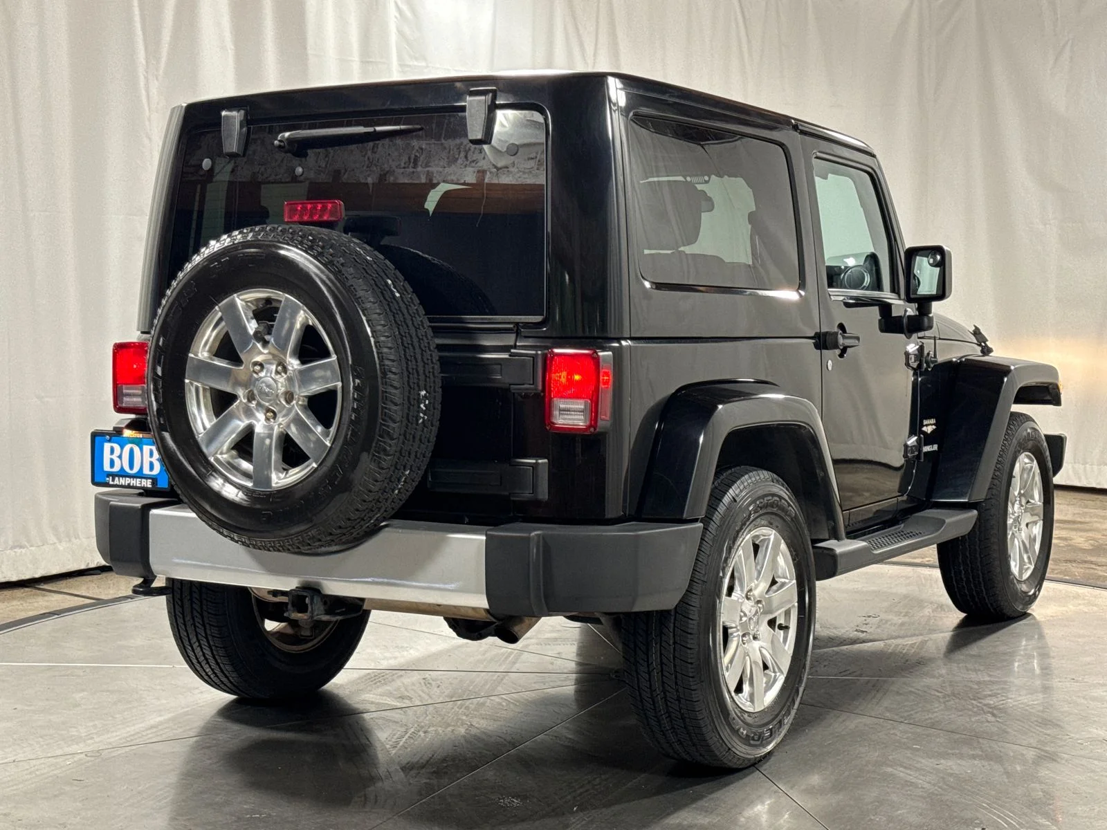 Used 2012 Black Clearcoat Jeep Sahara image 10