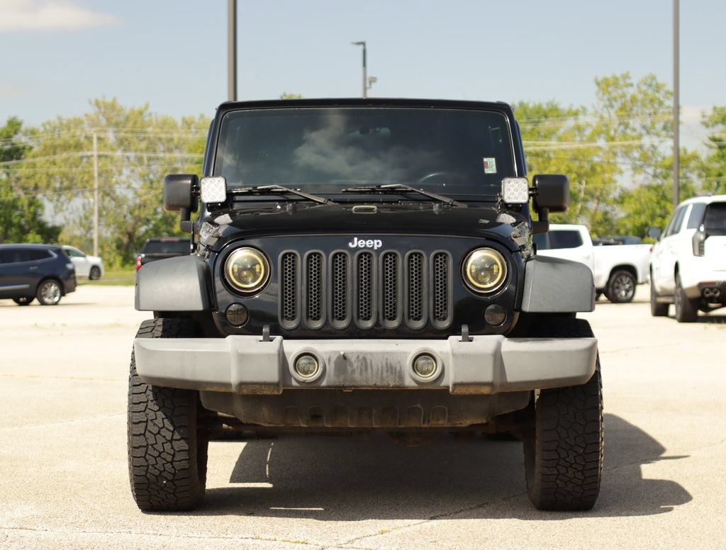 Used 2015 Jeep Wrangler Unlimited Sport with VIN 1C4BJWDGXFL525204 for sale in Pekin, IL