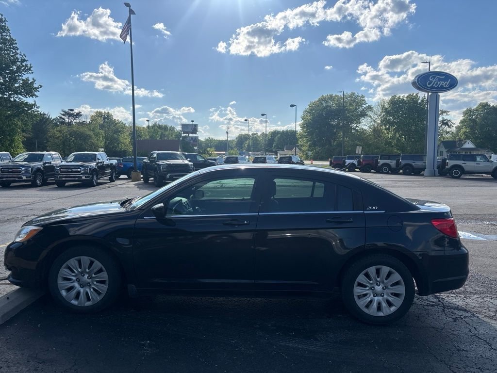 Used 2012 Black Clearcoat Chrysler LX image 7