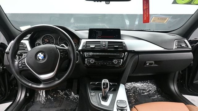 Used 2016 Black BMW 328i xDrive image 23