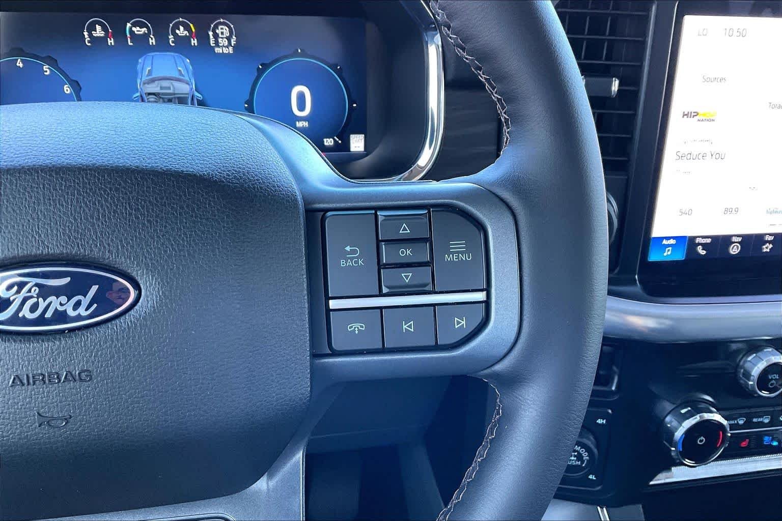 Used 2025 Carbonized Gray Metallic Ford LARIAT image 23