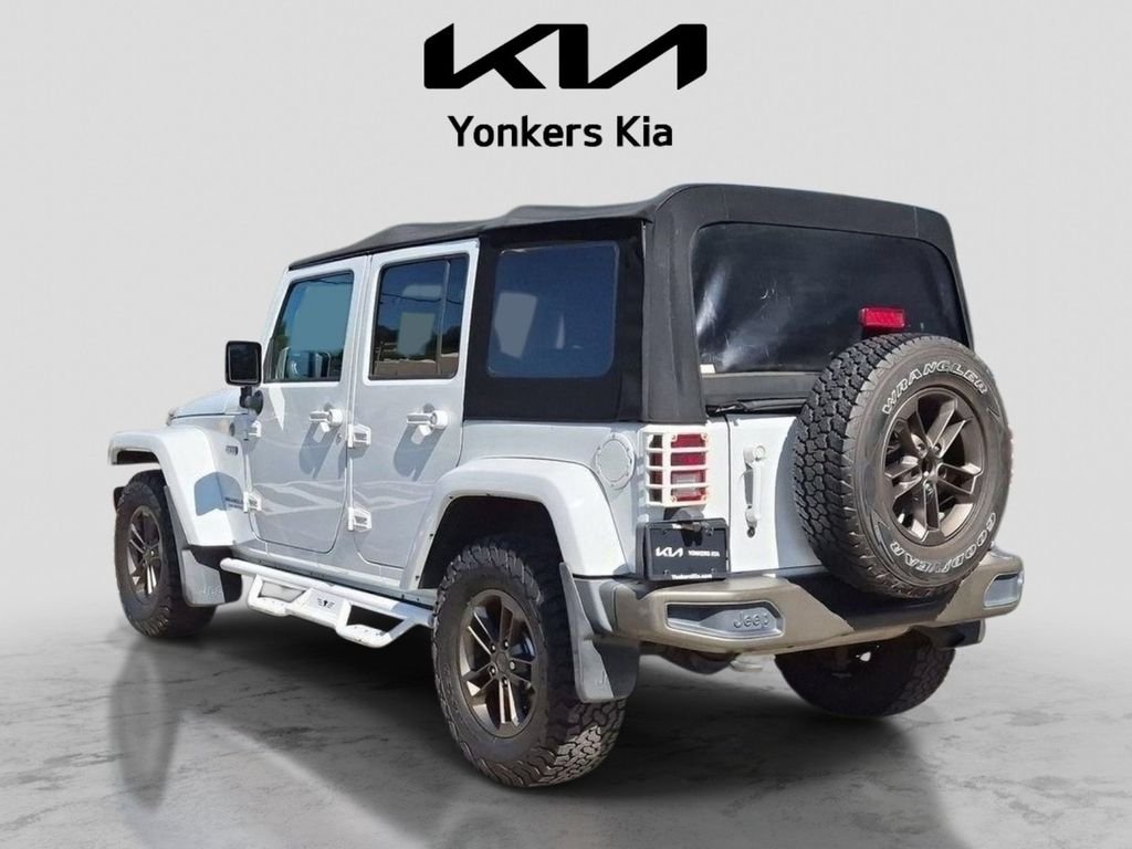 Used 2016 White Jeep Unlimited Sahara image 8