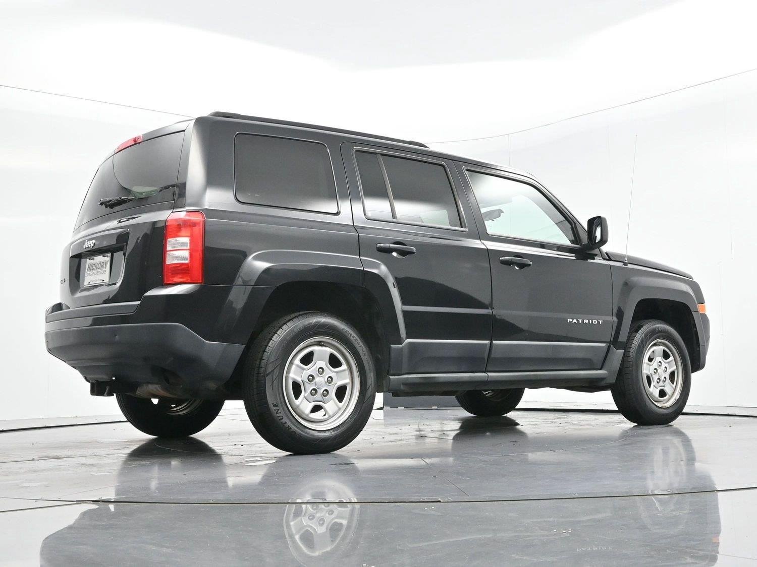 Used 2011 Brilliant Black Crystal Pearl Jeep Sport image 40