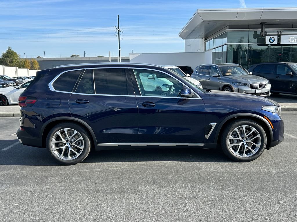 New 2026 Tanzanite Blue II Metallic BMW xDrive50e image 6