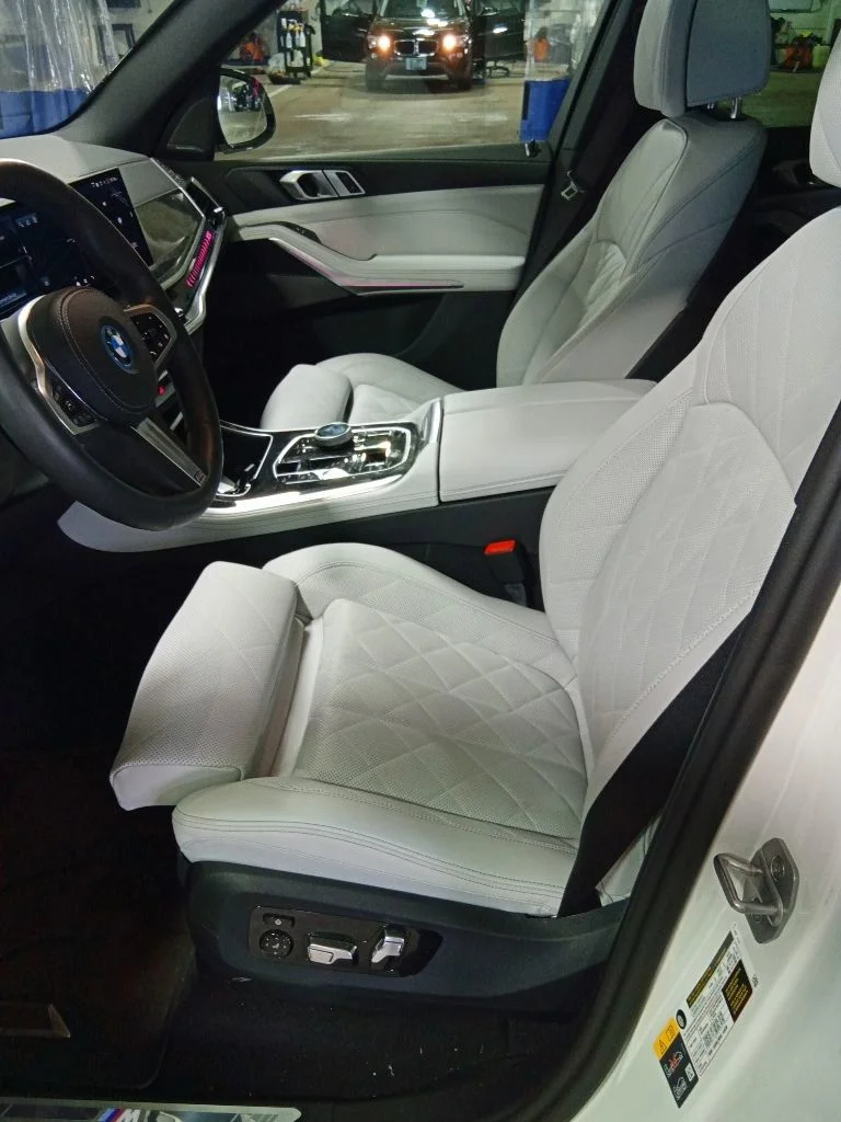 Used 2025 Mineral White Metallic BMW xDrive50e image 9