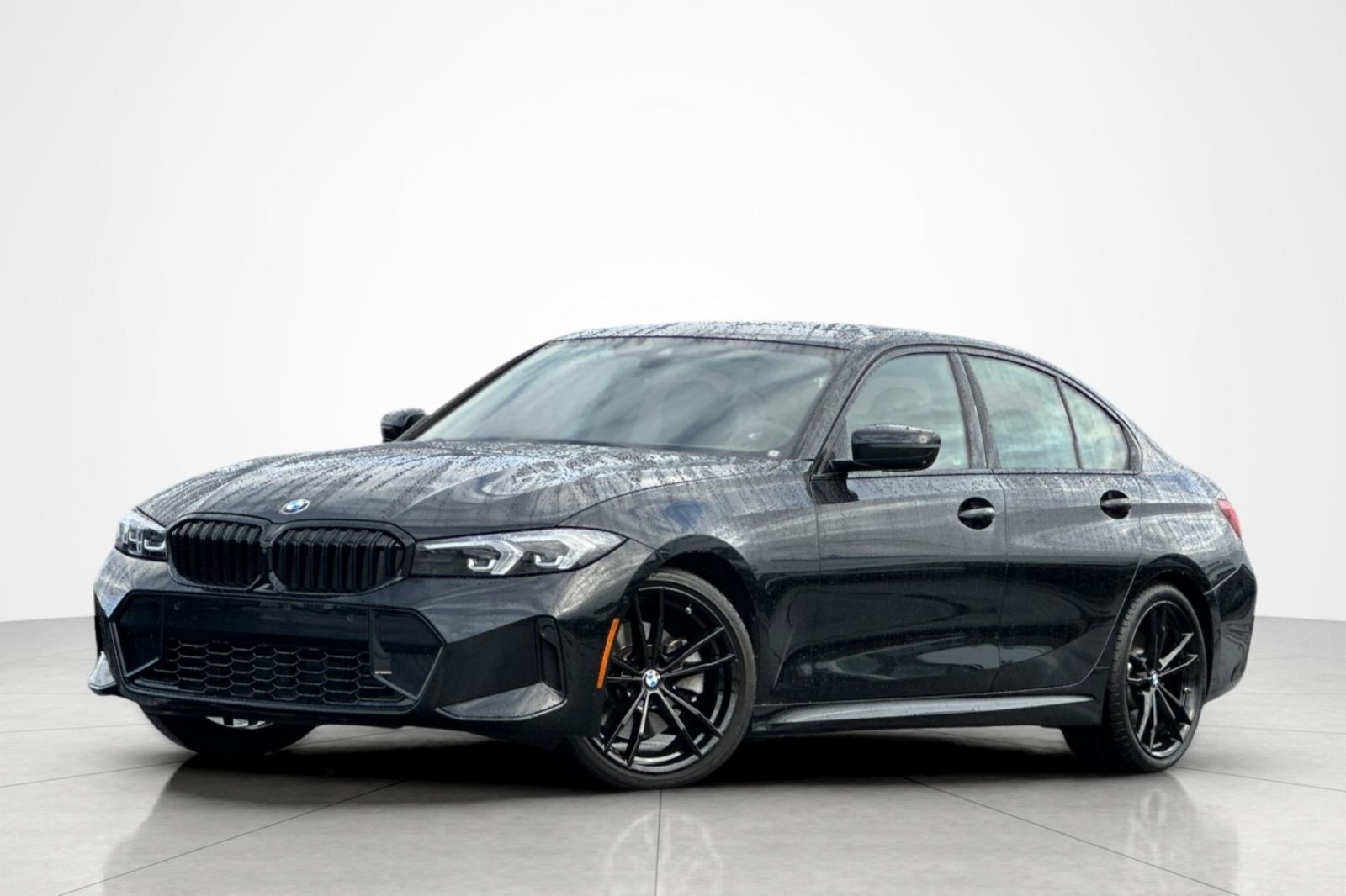 Used 2024 Black Sapphire Metallic BMW 330i image 1