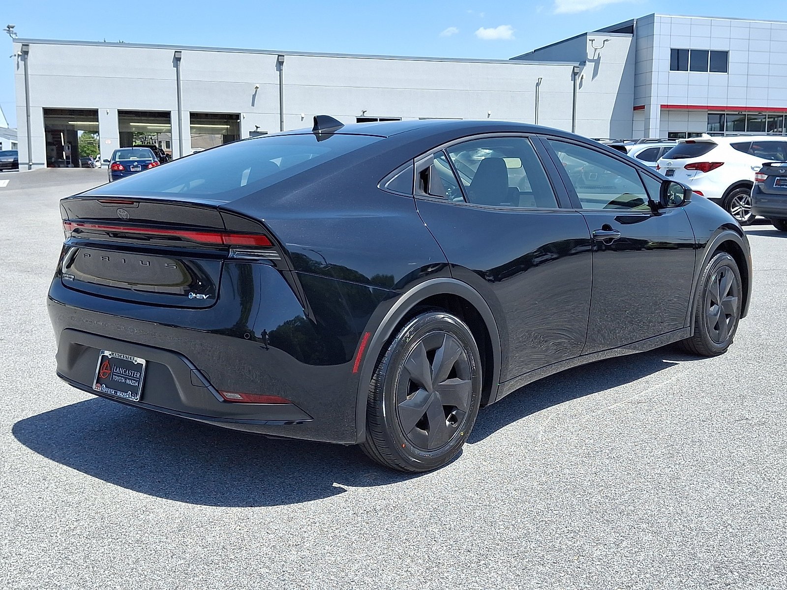 Used 2025 Midnight Black Metallic Toyota LE image 7