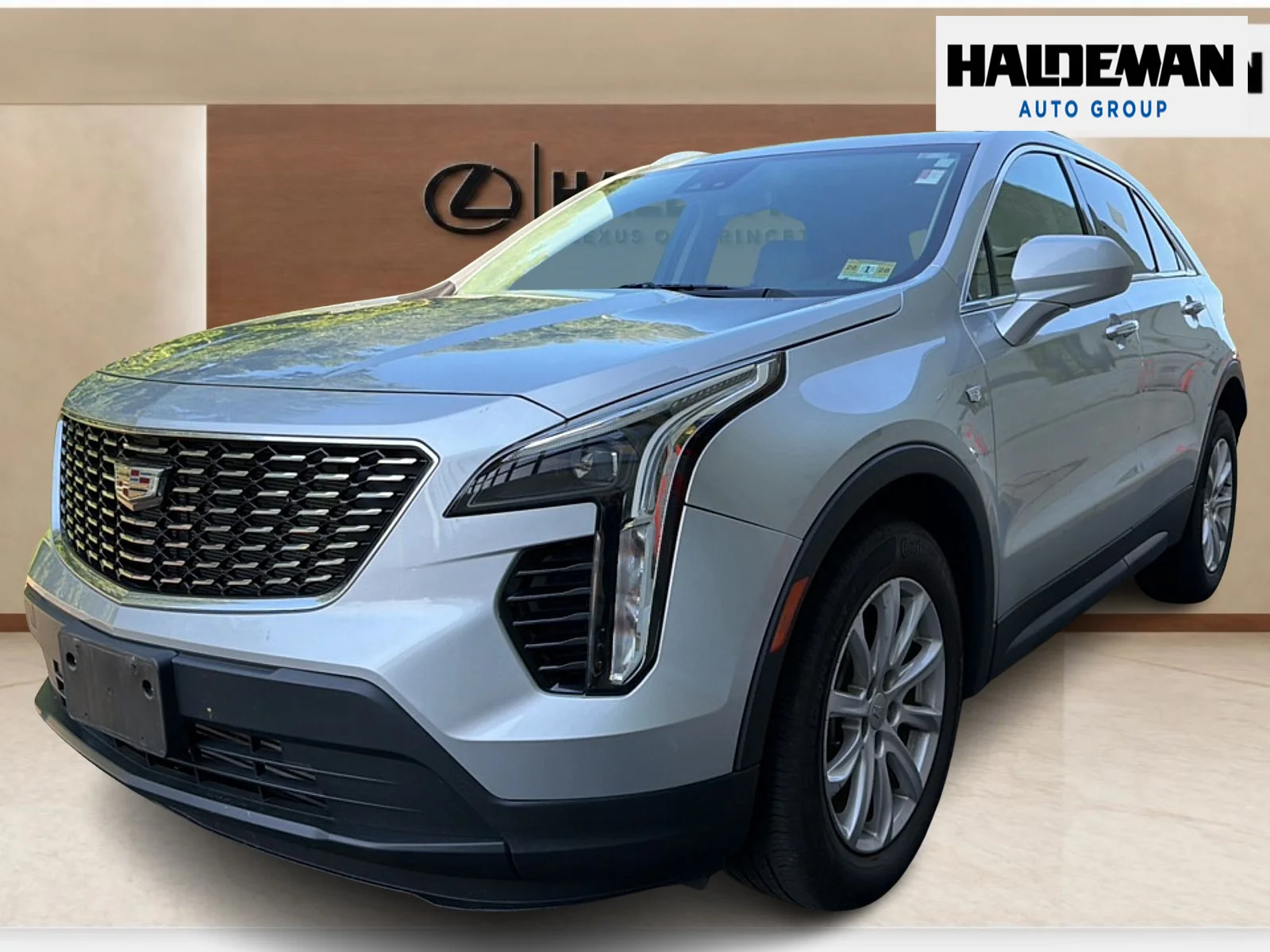 Used 2021 Radiant Silver Metallic Cadillac AWD Luxury image 2
