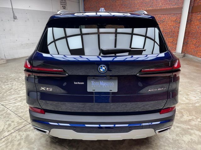 New 2026 Blue BMW xDrive50e image 4