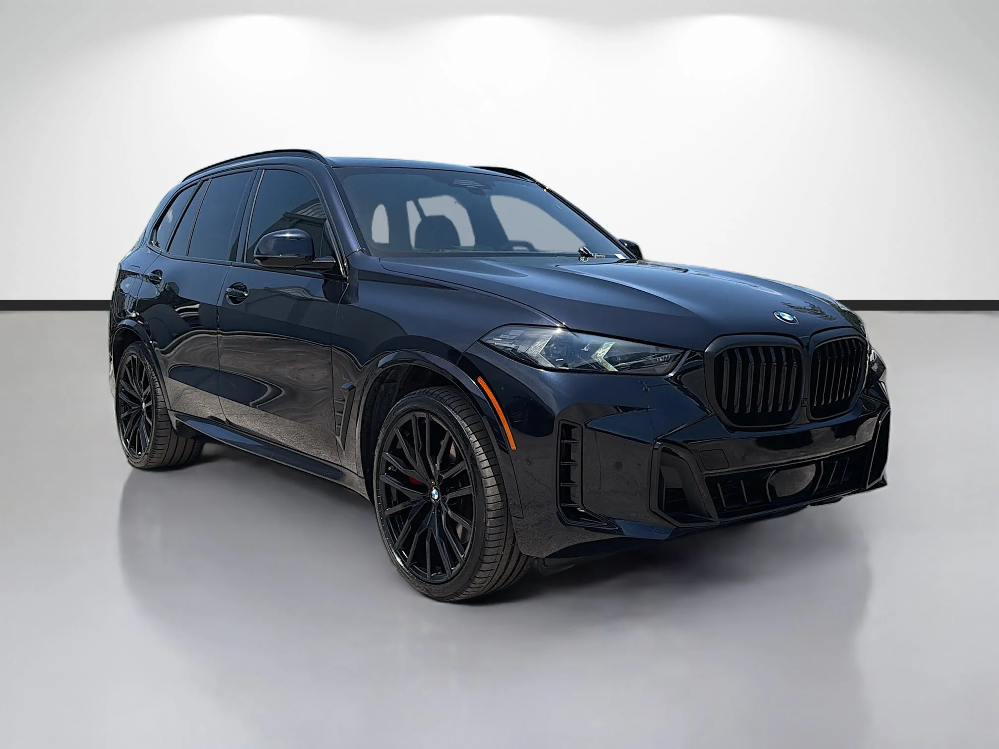 Certified Used 2025 Carbon Black Metallic BMW xDrive40i image 1