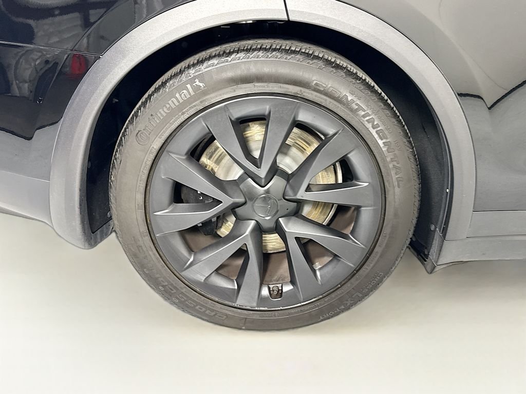 Used 2023 Solid Black Tesla  image 32