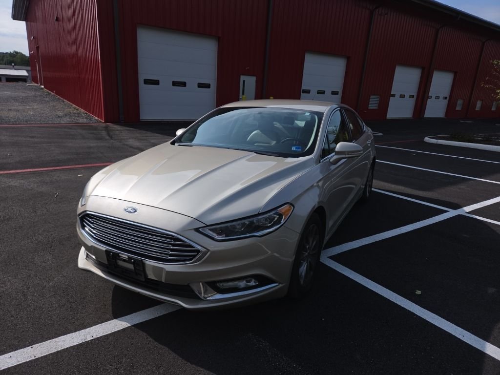 Used 2017 Gold Ford SE image 2